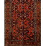 A Russian rug, CaucasusWool of geometric and floral pattern in salmon, beige and blue shades