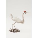 A long legged birdSilver and quartz crystal Moulded, scalloped and engraved decoration withe app