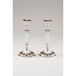 A pair of candlestandsPortuguese silver Neoclassical decoration of fluted shaft with beaded frie