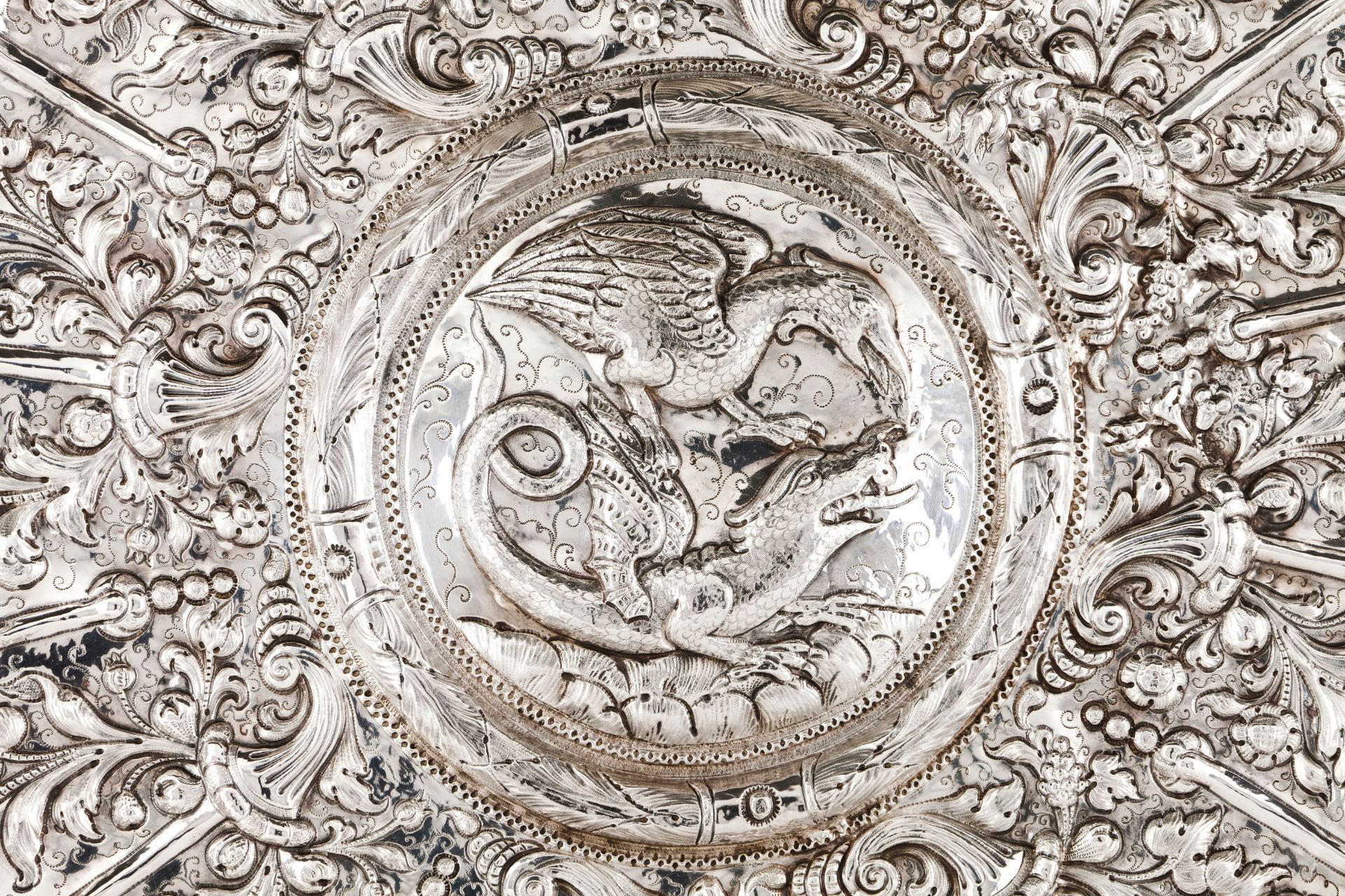 A large display salverSilver, 18th century Gadrooned of profuse repousse and chiselled foliage, - Bild 2 aus 3
