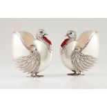 A pair of turkeysPortuguese silver and nautilus shell Moulded, chiselled and engraved silver wit