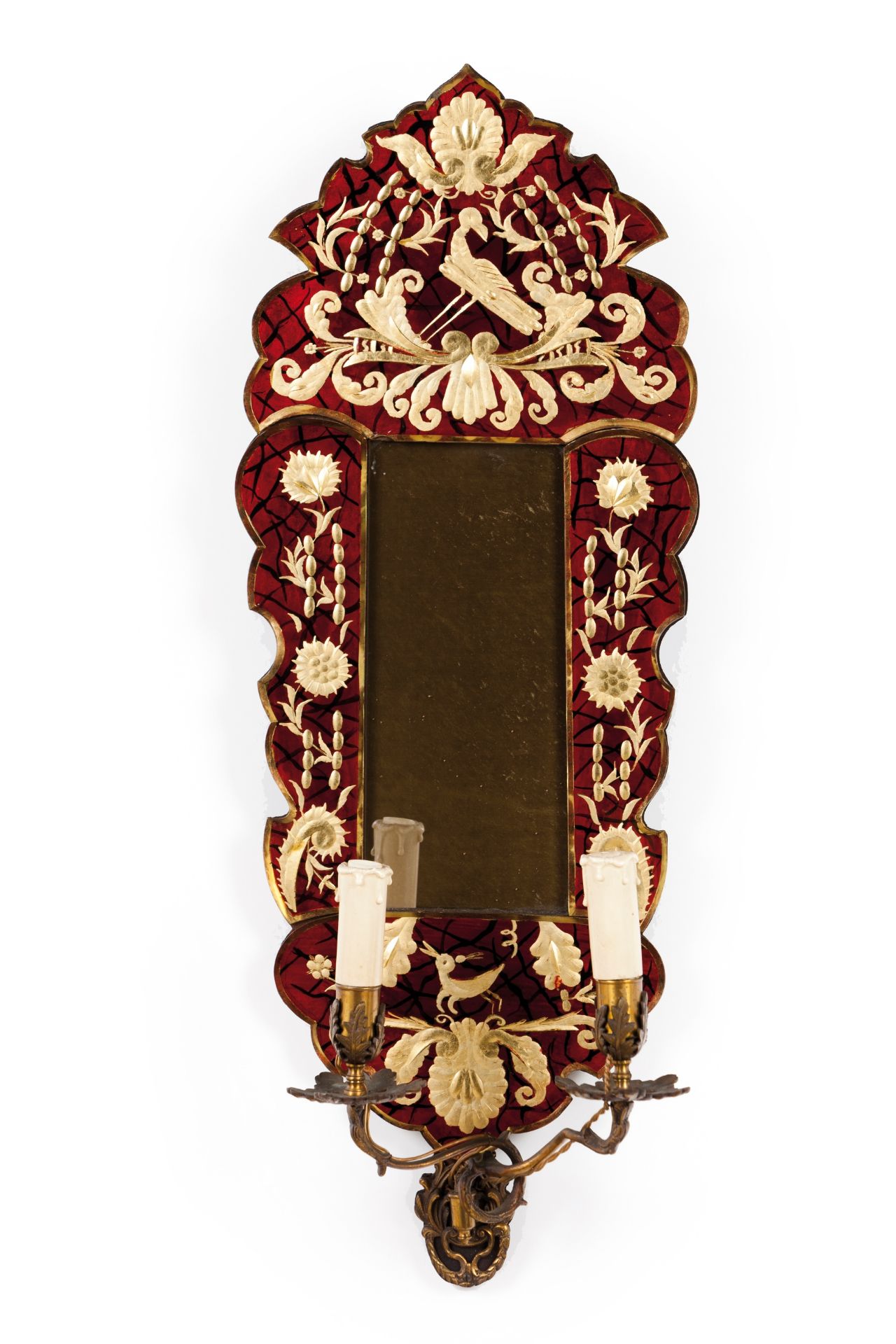 A pair of Venetian mirrors with sconces