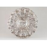 A large display salverSilver, 18th century Gadrooned of profuse repousse and chiselled foliage,