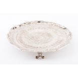 A salver18th c. European silver with later guilloche bands and foliage scroll decoration, on 3 f