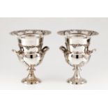 A pair of large wine coolersEnglish silver plate Urn shaped of wine related decorative bands and