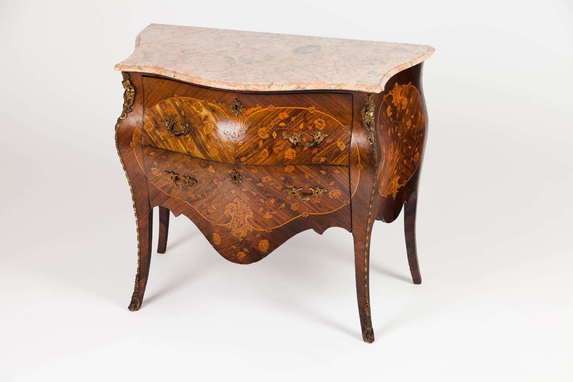 A pair of small Louis XV commodes