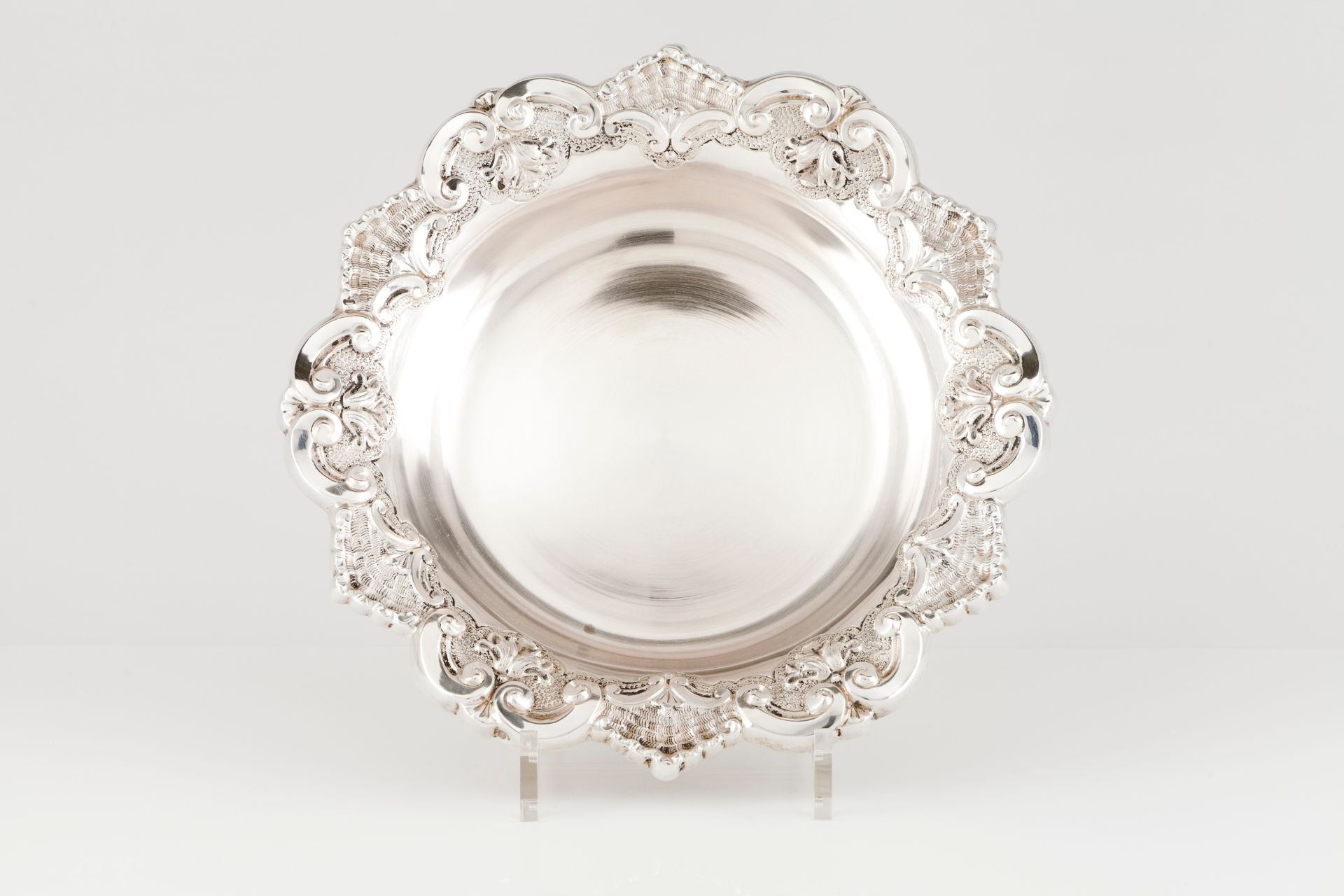 A fruit bowlPortuguese silver Plain centre of scalloped lip with wiglet, shell and acanthus leav