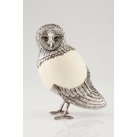 An owlSilver and ostrich egg Moulded decoration of engraved and chiselled feathers with applied