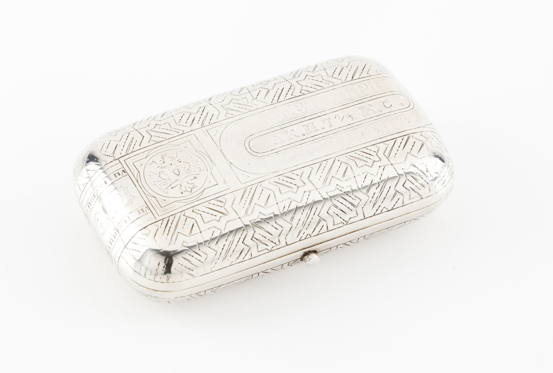 A cigarette caseRussian silver, 19th century Rectangular shaped of engraved decoration simulatin