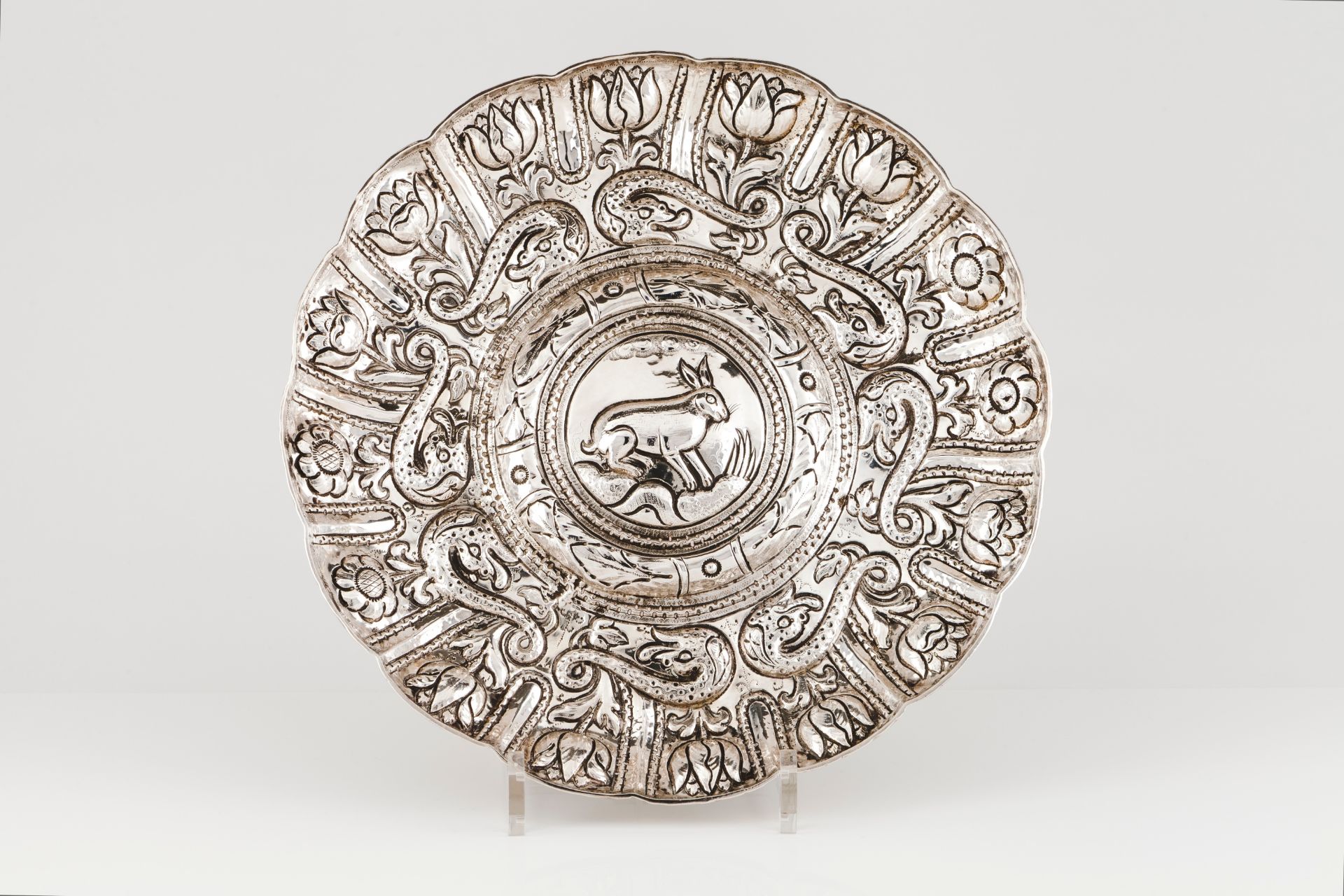 An unusual gadrooned salverPortuguese silver, 18th century Profuse repousse and chiselled decora