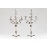 A pair of four branch candelabraLouis XVI style plated bronze Profuse raised decoration of flowe