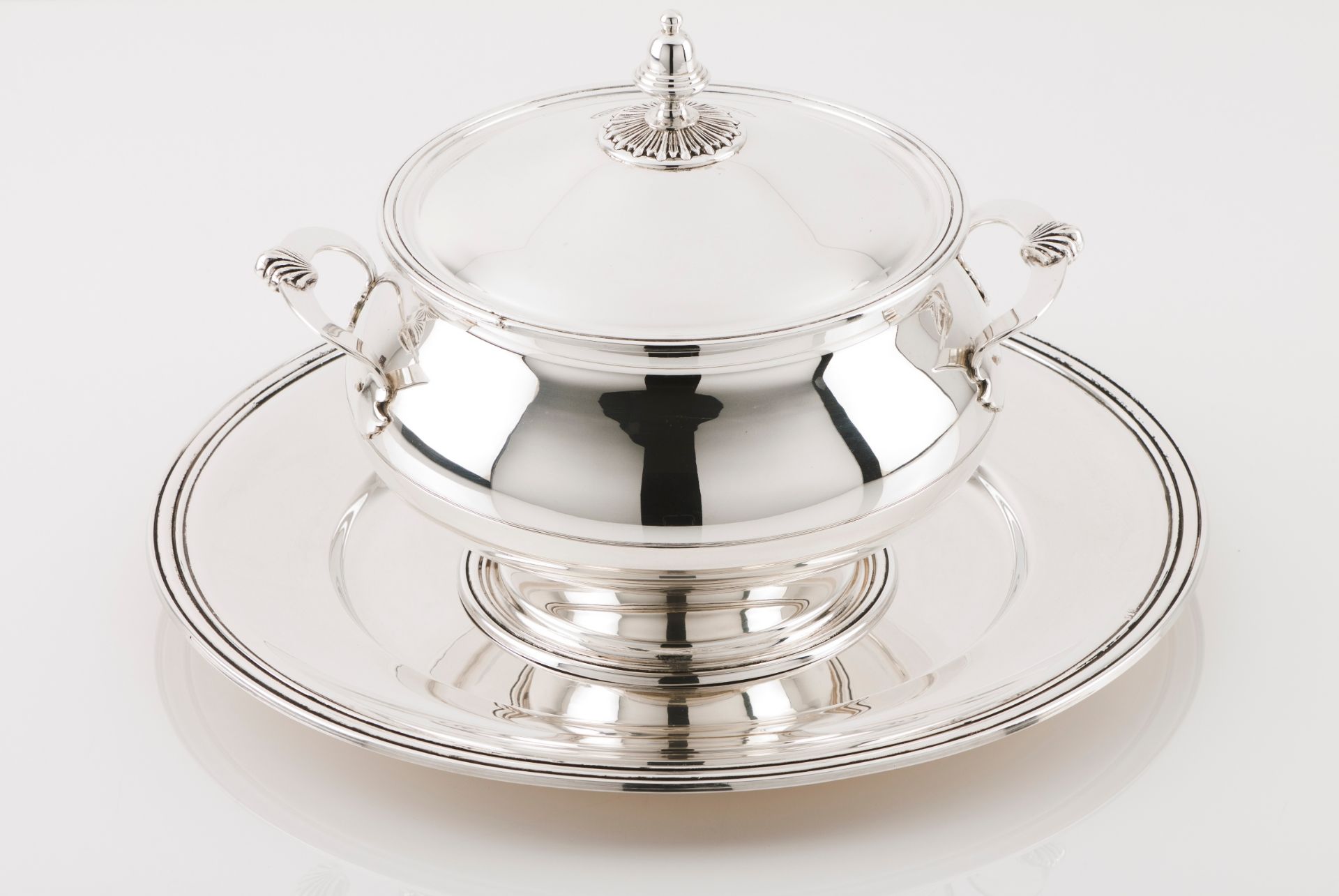 A tureen with cover and trayPortuguese silver Plain body on circular foot Bell shaped lid pommel