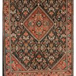 A Zarand rug, IranWool and cotton of geometric and floral pattern in salmon, blue and beige shad