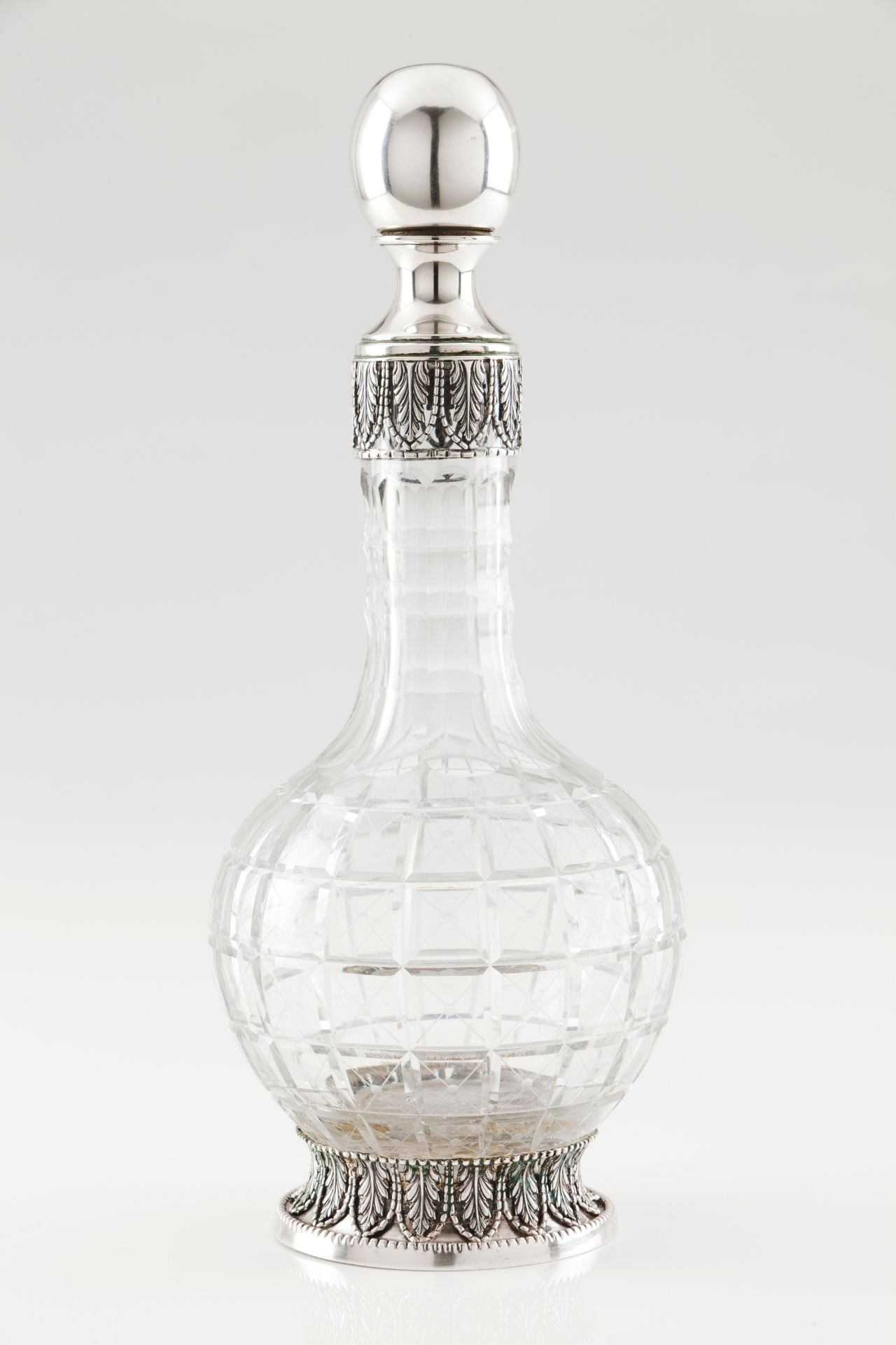 A bottle with stopperSilver and cut crystal Cut and engraved geometric decoration to body with a