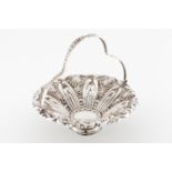 A footed fruit bowlPortuguese silver Profuse repousse decoration of foliage, winglets and shell