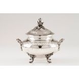 A tureen with coverPortuguese silver Circular body of spiralled fluting and floral bands decorat