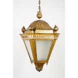 A large lanternGilt metal Neoclassical style decoration With four finials Portugal, 20th century (