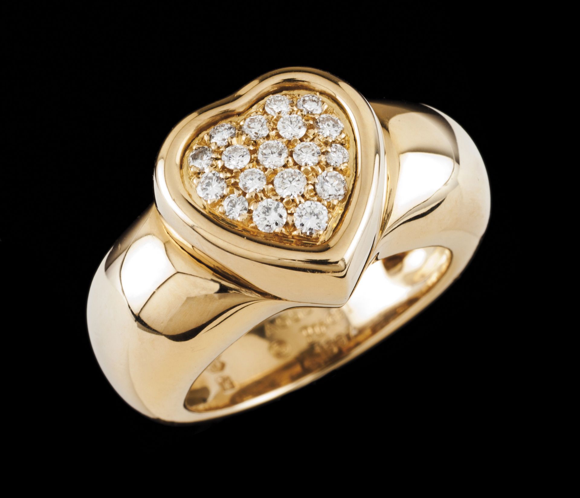 A Piaget ringGold Heart shaped set with 18 small brilliant cut diamonds pavé Deer hallmark 800/