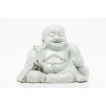 A BuddhaChinese porcelain "blanc-de-Chine" figure depicting the seated Buddha Marked to back 19th