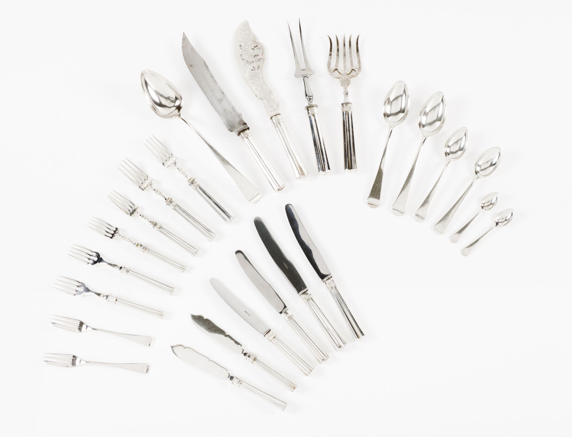 A twelve cover cutlery set Portuguese silver Fluted decoration known as "meia-cana" Soup spoons,