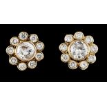 A pair of stud earringsGold Set with brilliant cut diamond each (ca. 0.50ct) and removable frame set