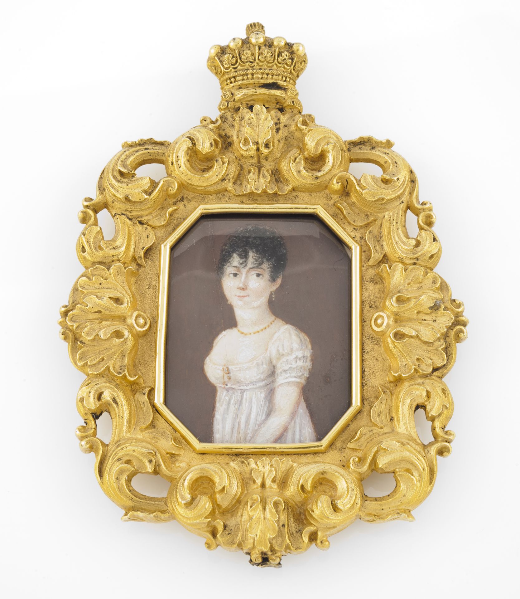 English school, 19th centuryMiniature on ivory Gilt and chiselled bronze frame of foliage motifs