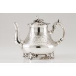 An unusual teapotPortuguese silver Bell shaped body of wide floral engraved band; faceted spout,