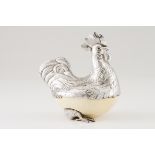 A Luiz Ferreira cockerelSilver and ostrich egg Moulded, scalloped and chiselled sculpture of