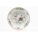 A large basinChinese export porcelain Polychrome floral "Famille Rose" enamelled decorati