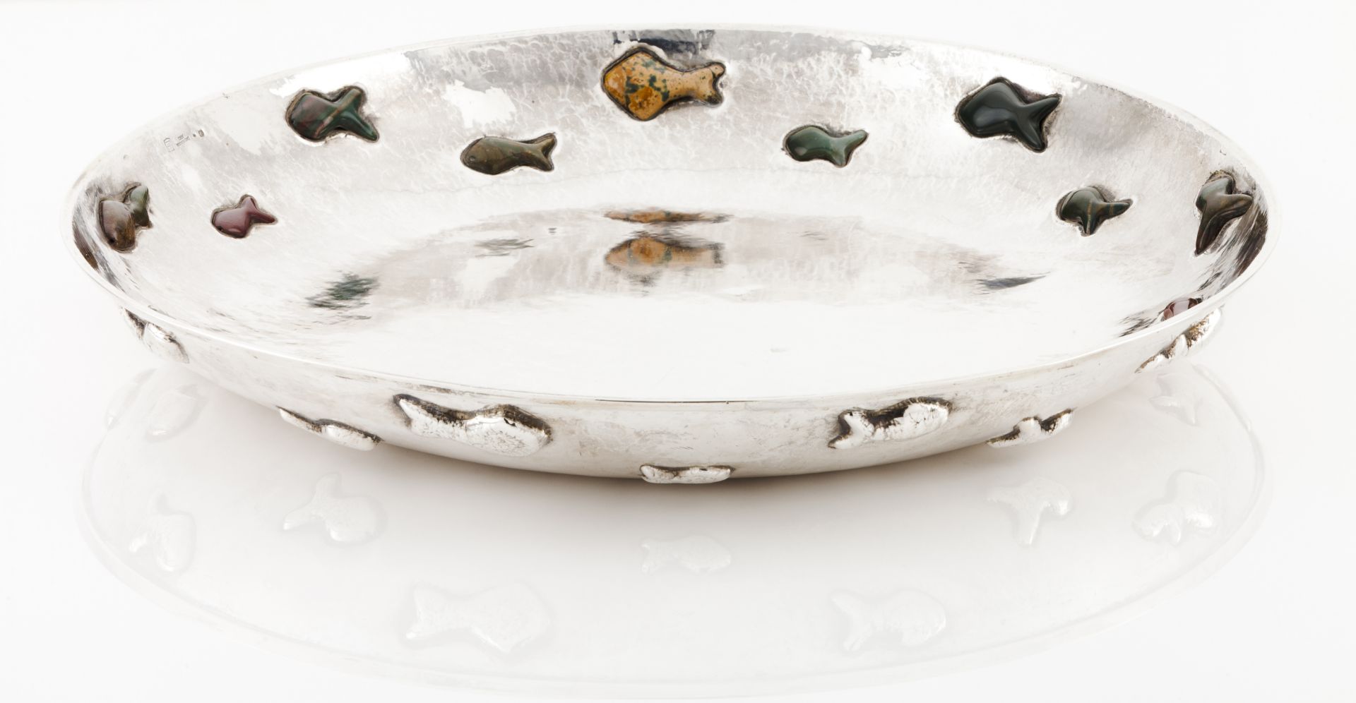 An unusual large David Ferreira bowlHammered silver Repousse fish silhouettes set with various