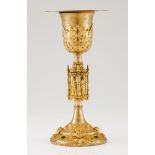 A large chalice with patenGilt silver Neogothic decoration Knot decorated with Saints in niches