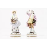 A pair of courting figuresPolychrome porcelain sculptures Europe, 19th / 20th century (faults and