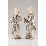 A pair of Luiz Ferreira dignitariesPortuguese silver Moulded, engraved and chiselled body Oriental