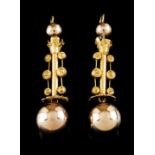 A pair of drop earringsGold Grained decoration with spherical drop Marked for 750/1000 19th/20th