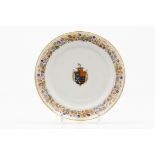 A plateChinese export porcelain Polychrome and gilt decoration with central armorial for Vital de