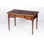 A deskMahogany and fruitwoods veneer Marquetry decoration and bronze mounts Three drawers and