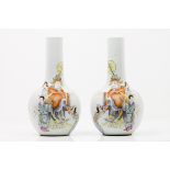 A pair of vasesChinese porcelain Polychrome "Famille Rose" enamelled decoration of oriental