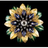 A large broochGold Flower made of 4 layers of blue and green enamelled leaves Central antique cut