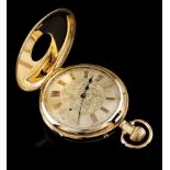 A half-hunter pocket watchGold case 750/1000 Gilt and chiselled dial of foliage inspired motifs,