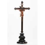 A Crucified ChristBoxwood sculpture Rosewood cross and darkened wooden stand Silver radiant halo