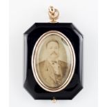 A medallionGold, small pearls and rubies with hanging loop On one side the portrait of the Count