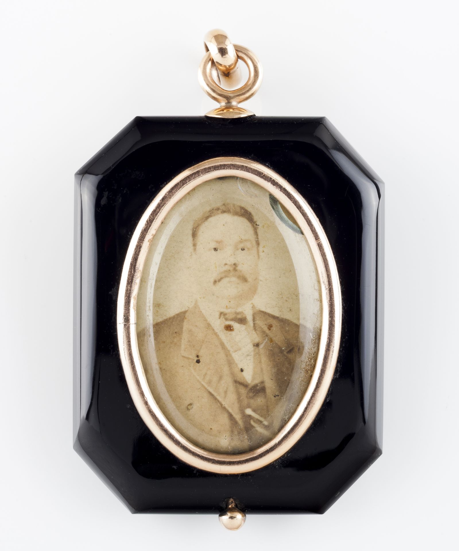 A medallionGold, small pearls and rubies with hanging loop On one side the portrait of the Count