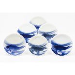 A set of six platesJapanese porcelain Blue decoration depicting a carp Five plates marked to the