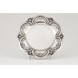A small salverPortuguese silver Plain centre and lobate lip of pierced floral, foliage and