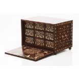 A small cabinetFall front teak and ebony cabinet Ivory inlaid of floral friezes, Indian figures