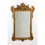 A D.José/D.Maria mirrorCarved and gilt wooden frame of volutes and foliage motifs decoration