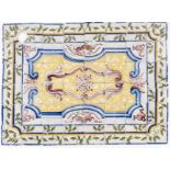 A tile panelA group of 48 glazed tiles Polychrome foliage motifs in blue, green, yellow and