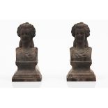 A pair of fire dogsWrought iron Depicting a female bust France, 19th century (signs of wear, minor