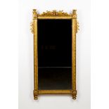 A louis XVI wall mirrorCarved and gilt wooden frame Beading, rosettes and foliage decoration