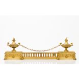 A Louis XV style fire grateChiselled and gilt bronze France, 19th centuryLength: 80 cm